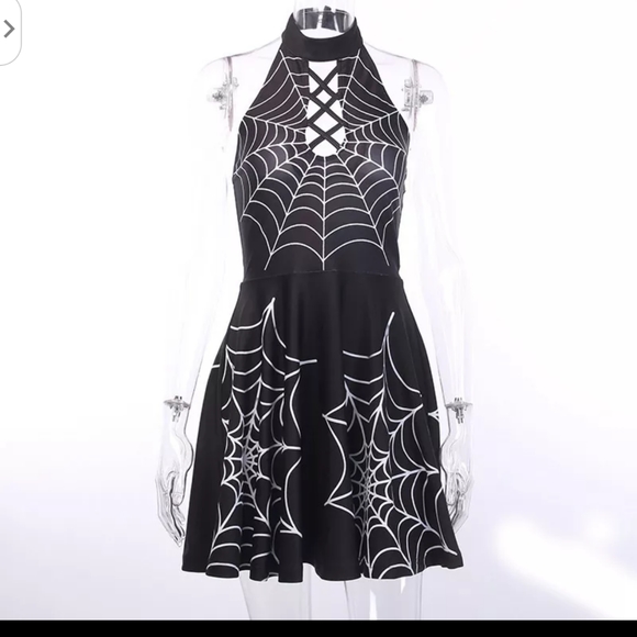 Cute little black dress with spiderweb design. - Picture 2 of 2